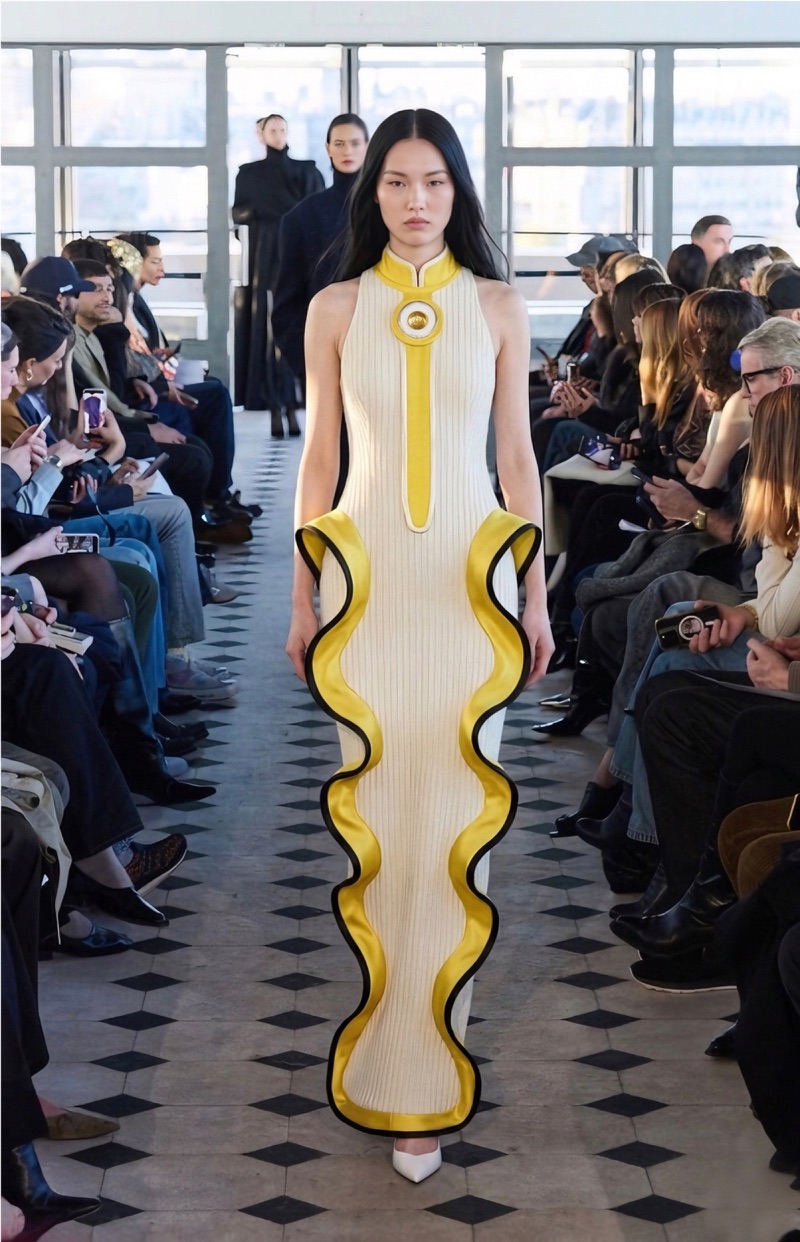 AI-generated runway look from the NOI collection in butter yellow with black wave outlines